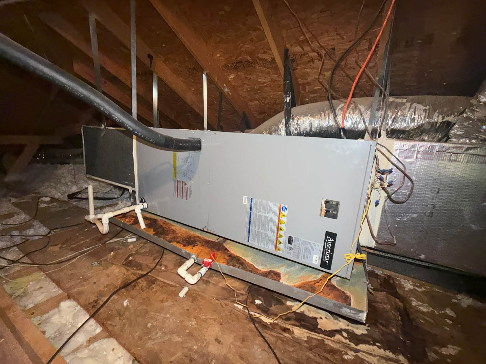 Air handler and insulated ductwork in an attic